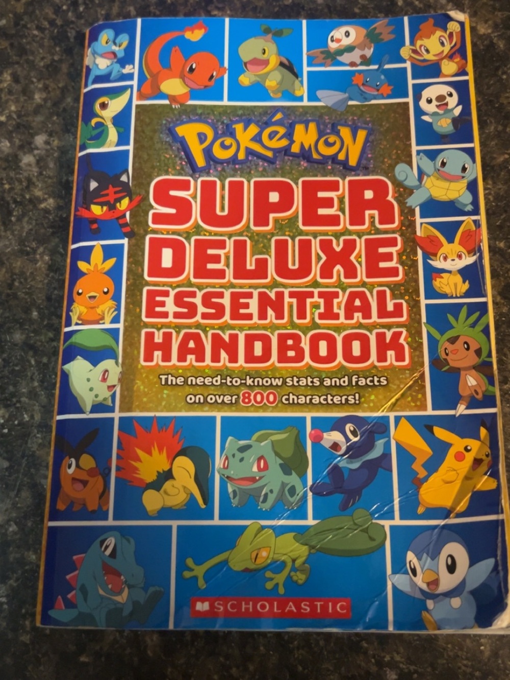 Pokemon Super Deluxe Essential Handbook - Blue, Red, Yellow